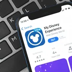 picture of phone and My Disney Experience app guide on app store